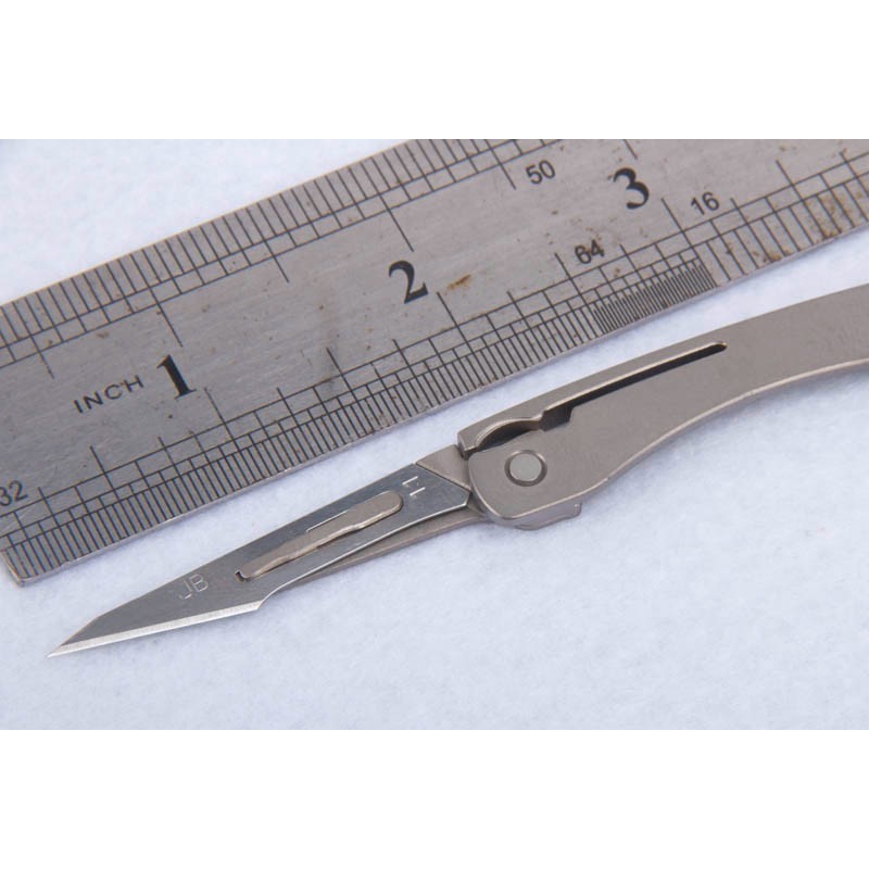 Titanium-alloy Daily Mini Folding Pocket Utility Knife with 10 Replaceable Blades图3